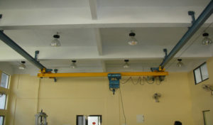 Under slung crane for manufacturing unit